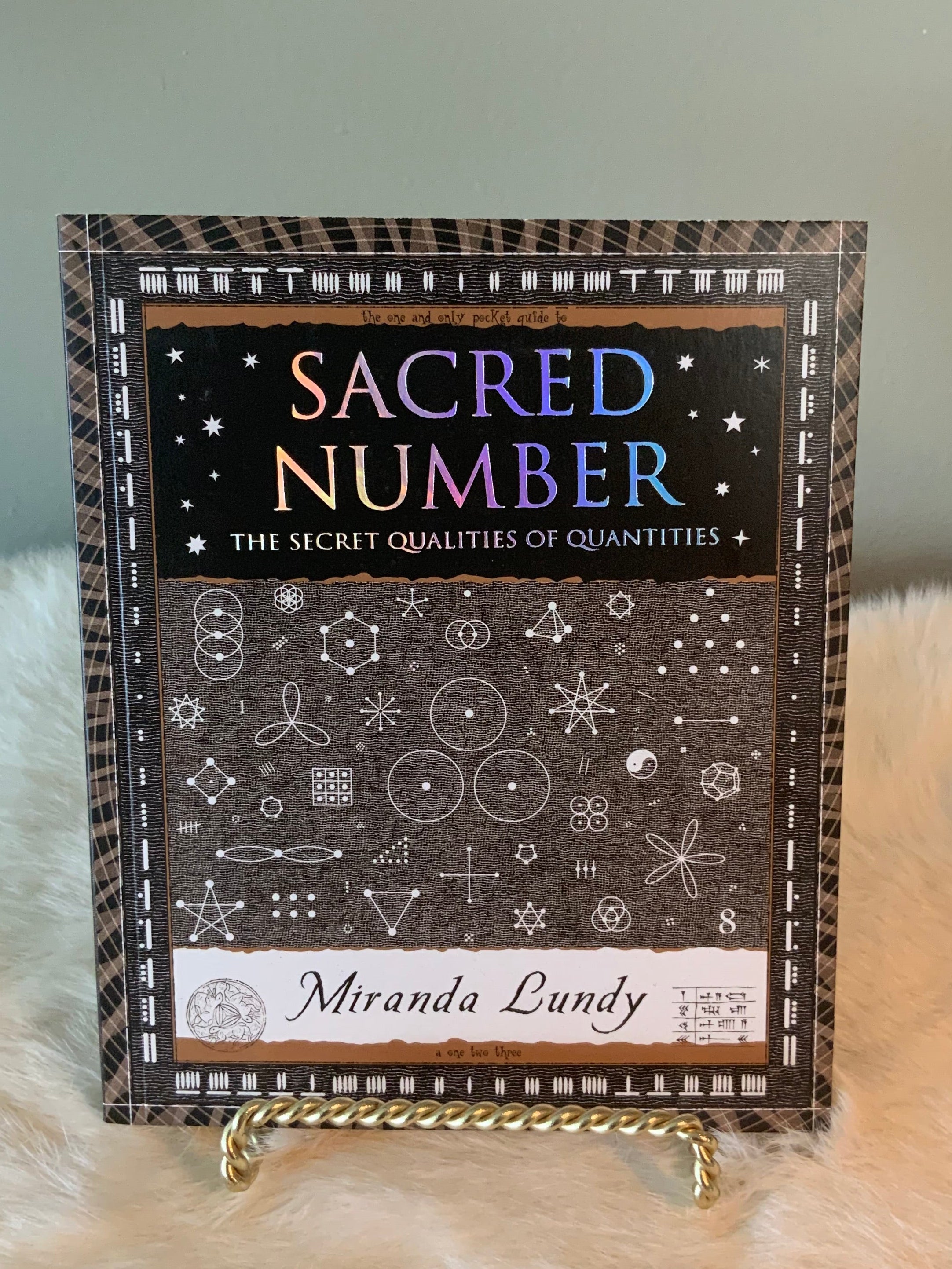 Sacred Number: The Secret Qualities of Quantities