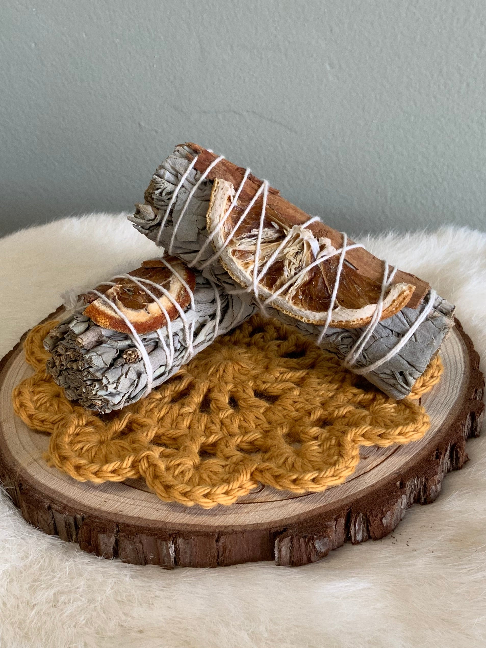 White sage, cinnamon, orange slice