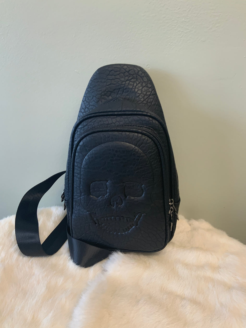 Skull Embossed Sling Bag in Vinyl